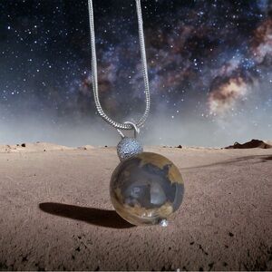 Extremely unique one of a kind earth and moon pendant.